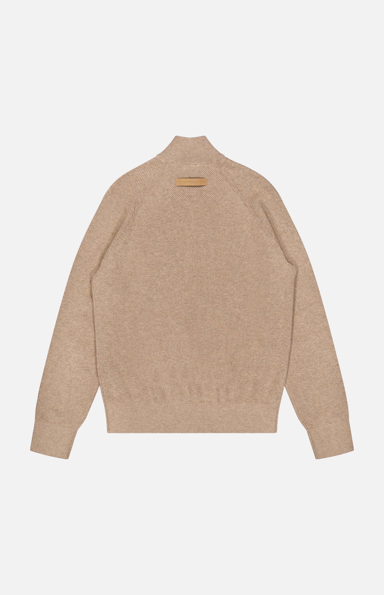 The Oasi Cashmere Zip Mockneck Sweater by ZEGNA is shown from the back in beige, crafted from Italian cashmere. It features a ribbed collar, cuffs, and hem, with a small tan rectangular label near the neckline. Presented against a plain background.