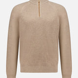 The Oasi Cashmere Zip Mockneck Sweater by ZEGNA is a beige long-sleeve sweater made from luxurious Italian cashmere, featuring a textured pattern, mock neck half-zip collar, and ribbed cuffs, presented on a plain white background.