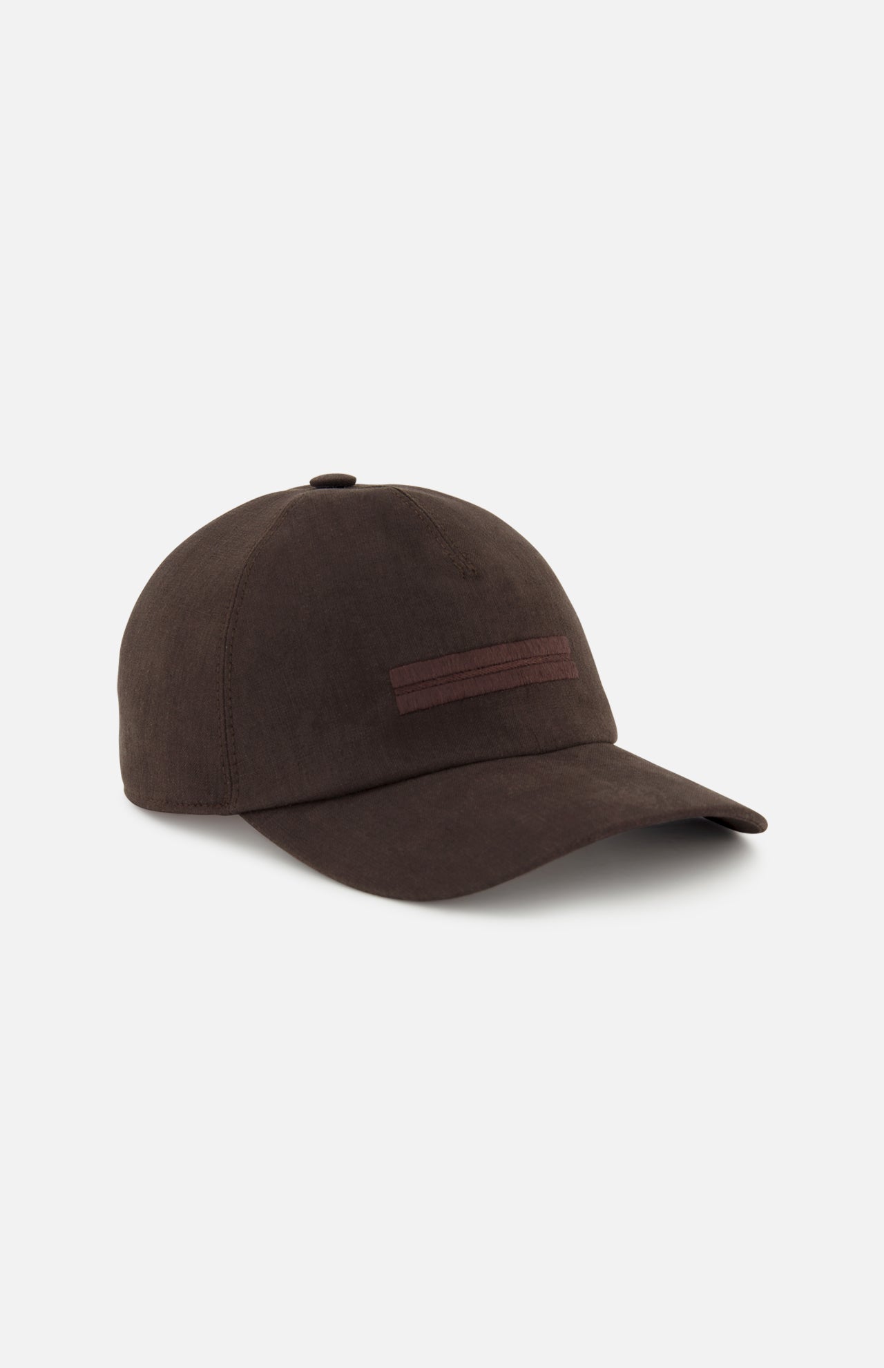 The ZEGNA Oasi Lino Lined Baseball Cap is a dark brown 100% linen cap featuring a curved brim and subtle horizontal stripe detail on the front, shown against a plain white background.