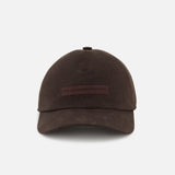 The ZEGNA Oasi Lino Lined Baseball Cap is a dark brown 100% linen cap with a curved brim and horizontal brown front stripe, shown against a white background.