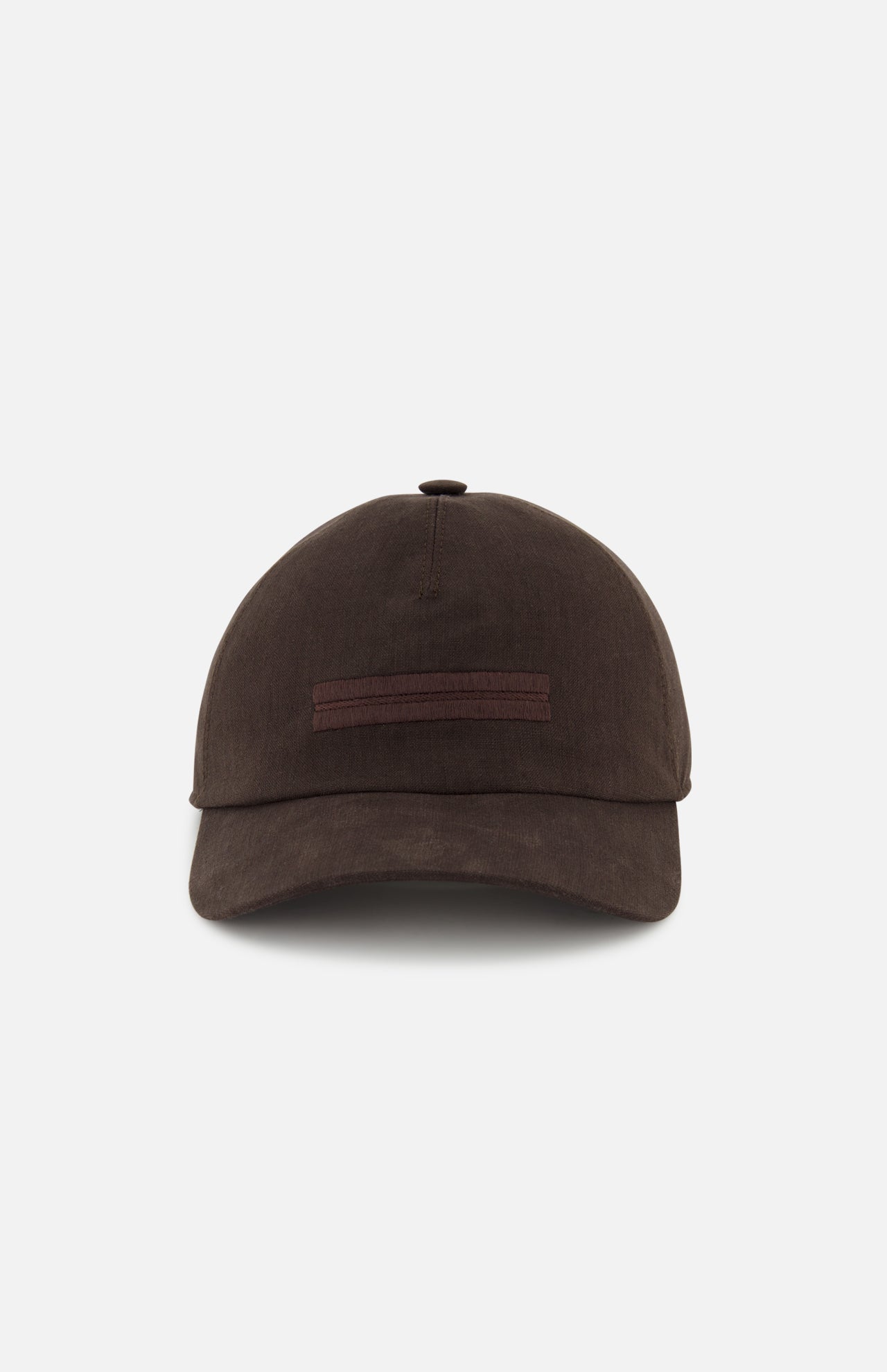 The ZEGNA Oasi Lino Lined Baseball Cap is a dark brown 100% linen cap with a curved brim and horizontal brown front stripe, shown against a white background.