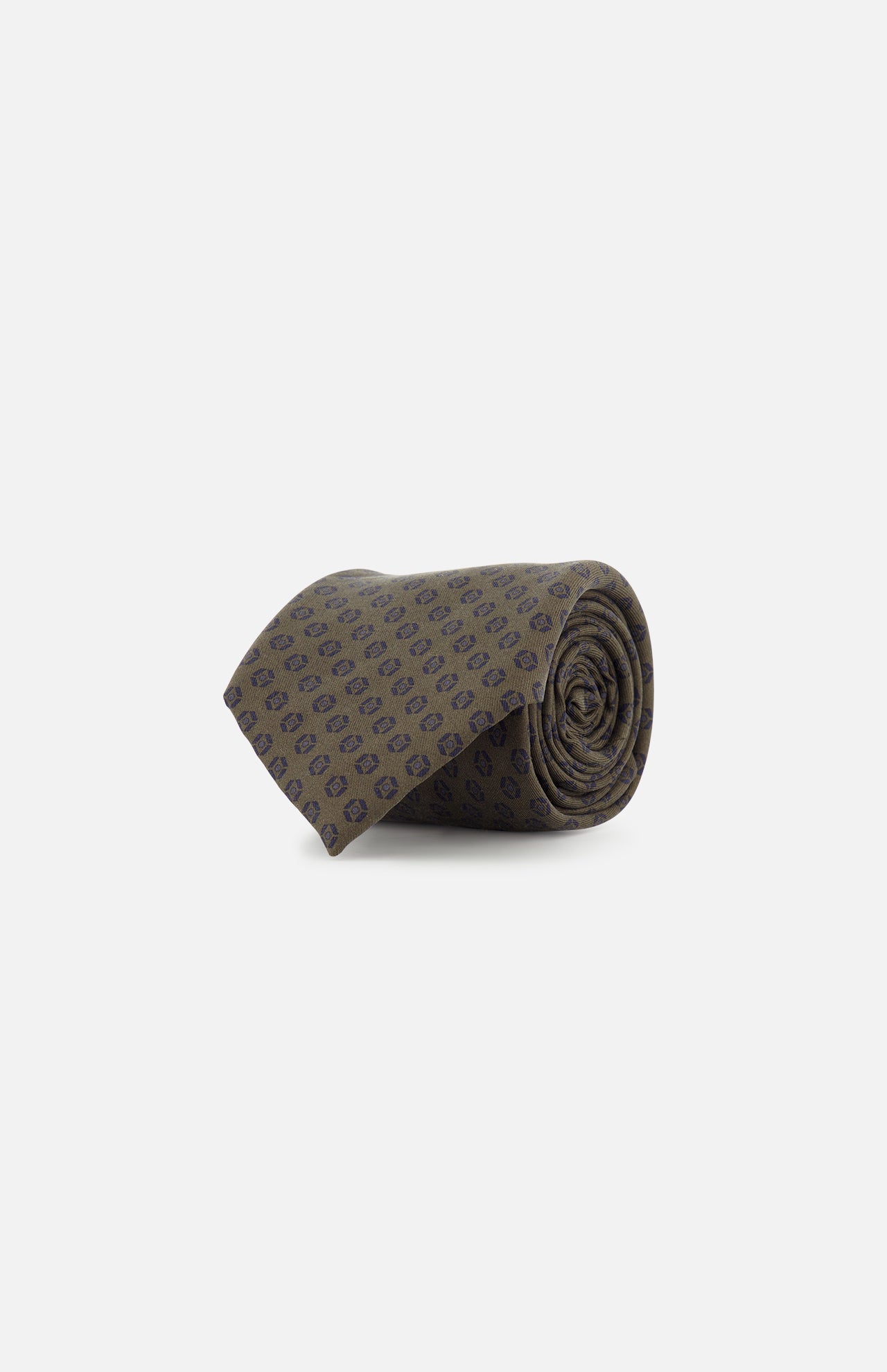 The ZEGNA Geometric Pattern Silk Tie features a dark green rolled-up design with subtle navy blue geometric motifs, crafted from silk and showcased on a plain white background.