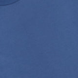 Close-up of a blue Pure Cotton T-Shirt by ZEGNA in 100% cotton with a relaxed fit and a visible black ZEGNA label at the neckline, shown on a flat surface.