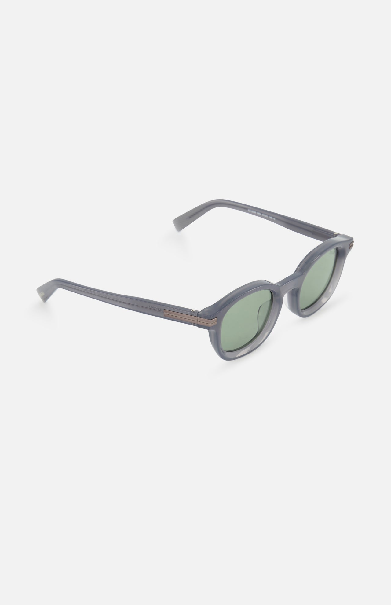ZEGNA Rounded Light Blue Sunglasses with light blue frames and lenses, shown on a white background at an angle highlighting both the front and side of the frames.