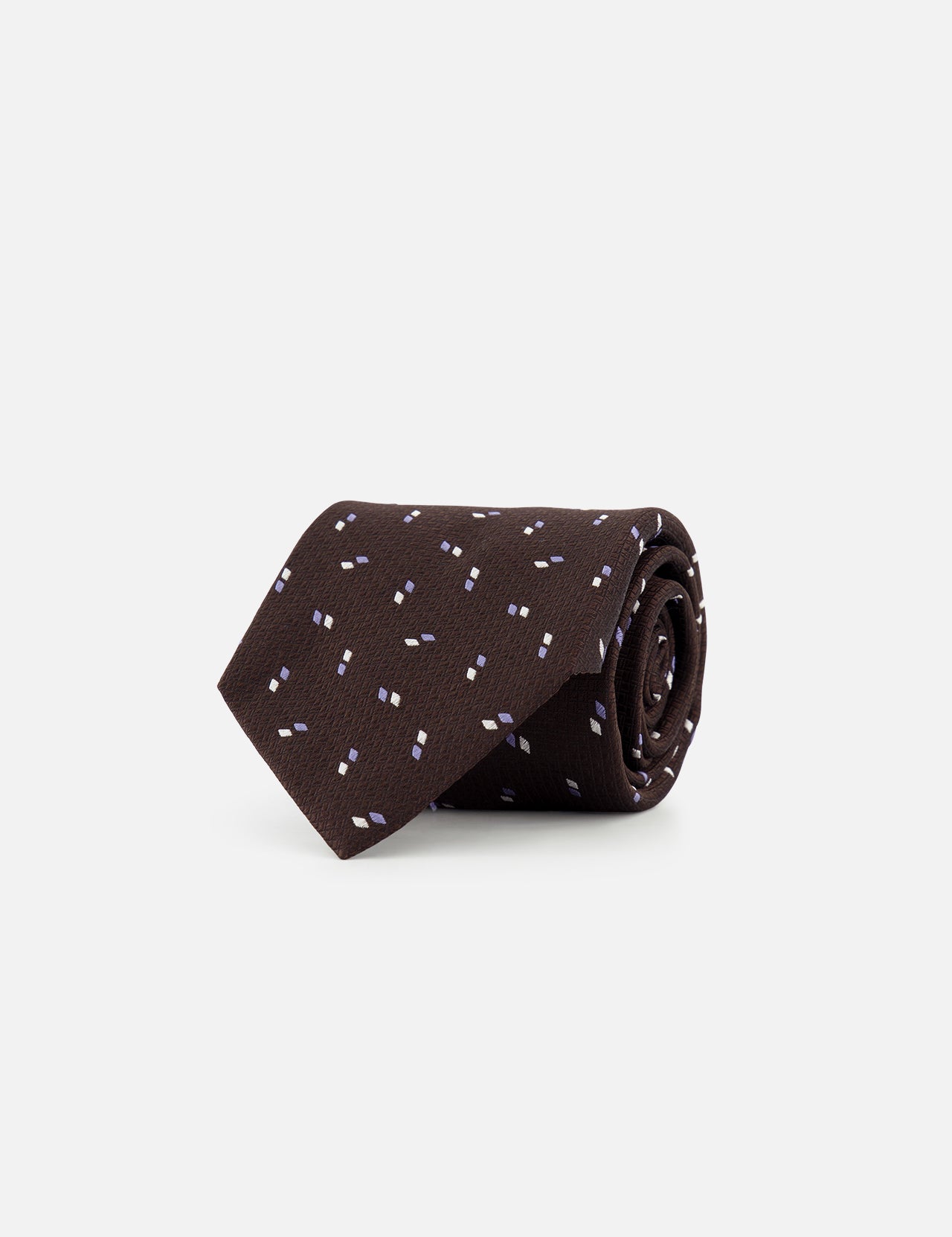 The ZEGNA Silk Jacquard D Neck Tie, made in Italy, features a dark brown color with a subtle pattern of small white and light blue dashes, shown rolled up against a plain white background.