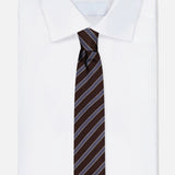 A white dress shirt with a pointed collar is paired with the ZEGNA Silk Jacquard Diagonal Stripes Neck Tie in blue and white, displayed on a plain white background.