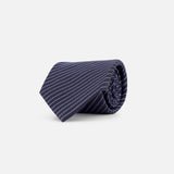 The ZEGNA Silk Jacquard Diagonal Stripes Neck Tie, crafted in Italy and shown on a white background, features a classic navy design with white diagonal detailing—a refined men’s accessory.