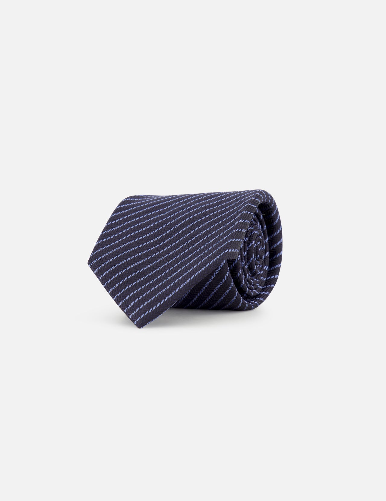 The ZEGNA Silk Jacquard Diagonal Stripes Neck Tie, crafted in Italy and shown on a white background, features a classic navy design with white diagonal detailing—a refined men’s accessory.