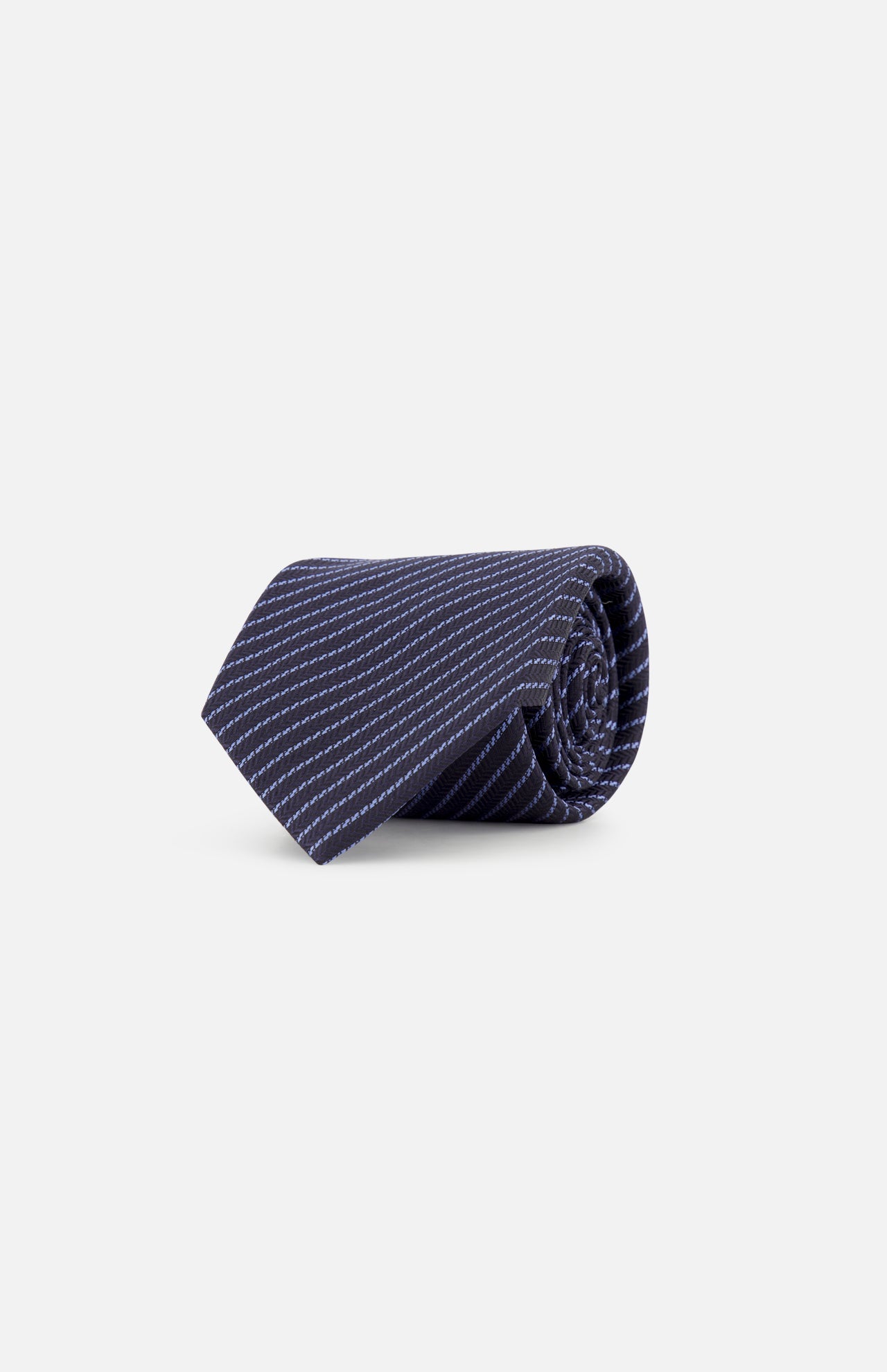 The ZEGNA Silk Jacquard Diagonal Stripes Neck Tie, crafted in Italy and shown on a white background, features a classic navy design with white diagonal detailing—a refined men’s accessory.