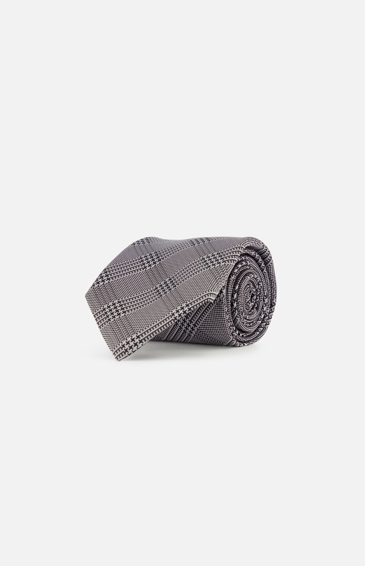 A ZEGNA Silk Jacquard Tie featuring a black and white plaid pattern in grey and black tones, expertly crafted in Italy, is showcased against a plain white background.