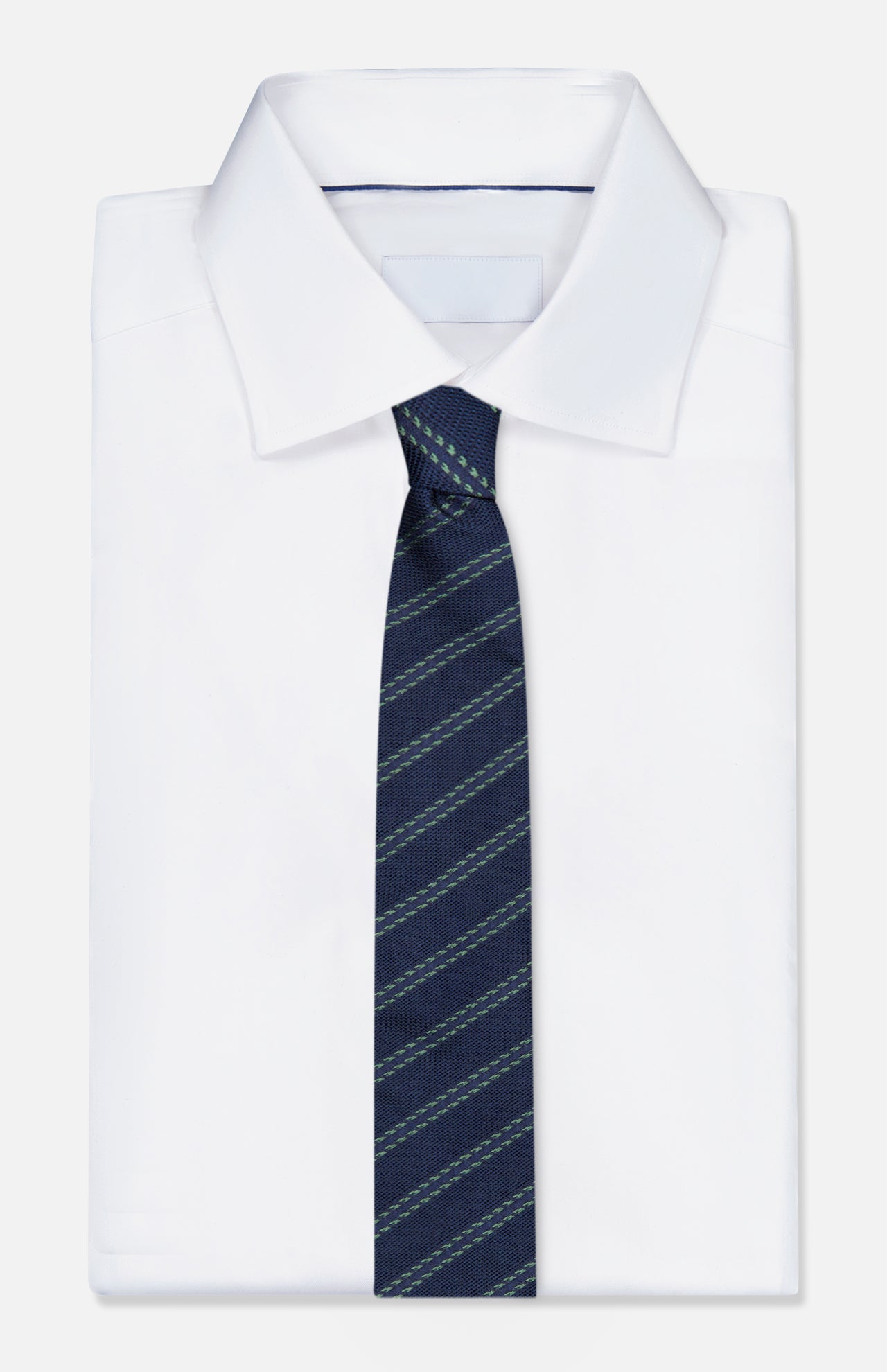 A neatly folded white dress shirt with a pointed collar is paired with the ZEGNA Silk Jacquard Tie, a navy accessory featuring diagonal light blue stripes, and displayed on a plain white background.