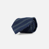 A ZEGNA Silk Jacquard Tie, crafted in Italy, features a navy base with diagonal green stripes and is shown rolled up against a plain white background.