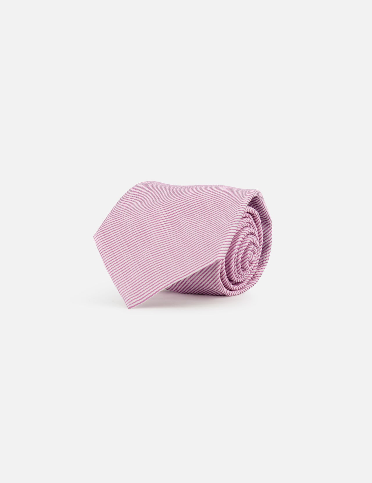 The ZEGNA Silk Jacquard Neck Tie features a light pink hue with thin white diagonal stripes, showcased on a plain white background—a classic Italian men's fashion accessory.