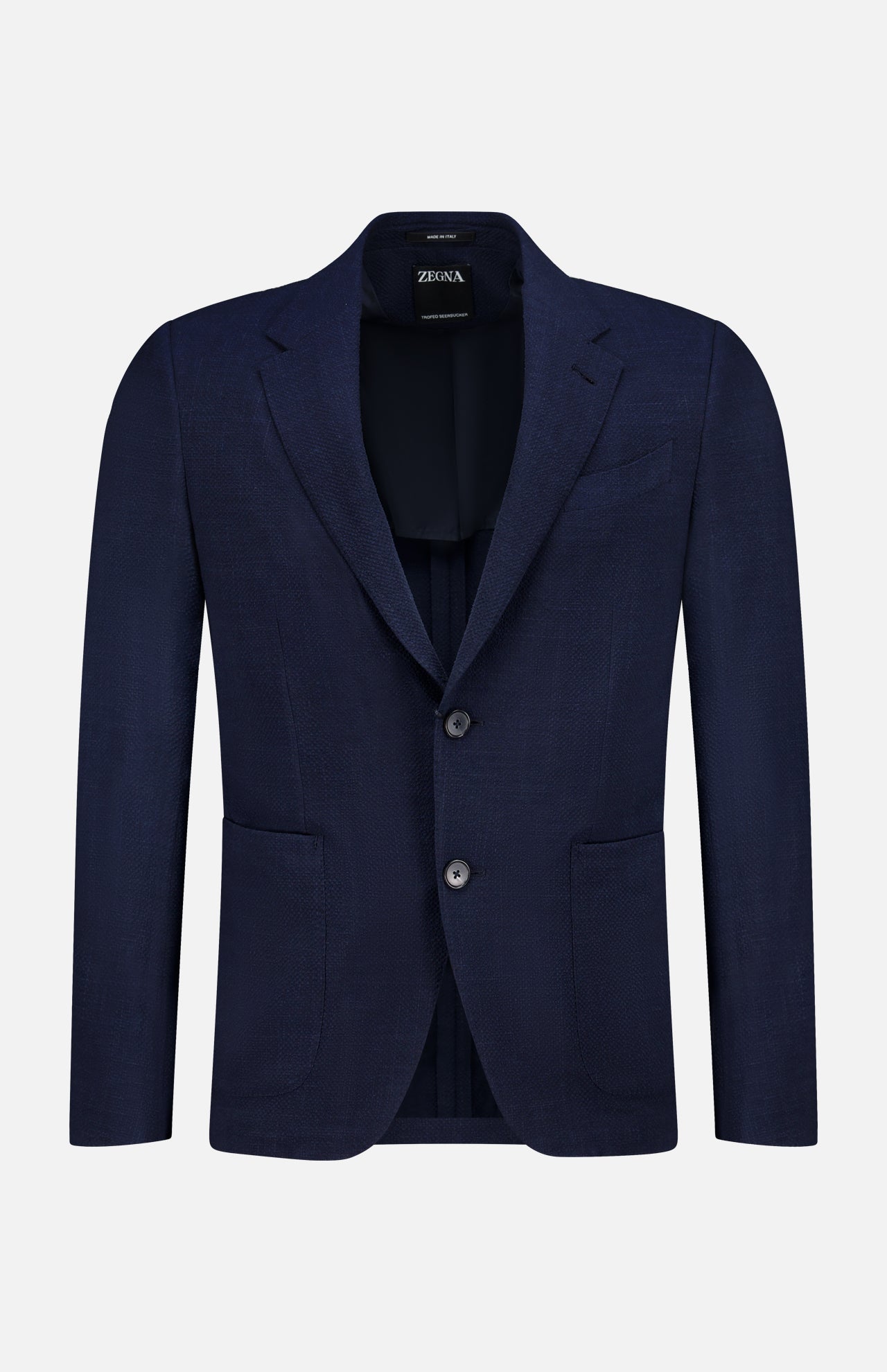 The ZEGNA Trofeo Seersucker Suit Jacket is a dark navy men's blazer featuring notch lapels, two front buttons, and two patch pockets—an essential for any professional wardrobe, shown on a plain white background.