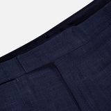 Close-up of the waistband and upper section of ZEGNA’s Trofeo Seersucker Suit Trouser Pant, showcasing the textured navy fabric, adjustable side tabs, and a partially visible seam.