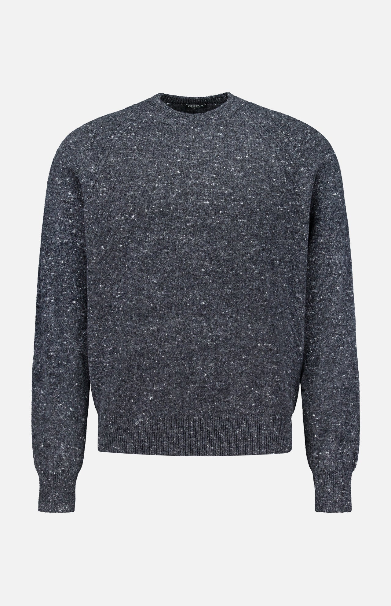The ZEGNA Wool & Cashmere Blend Crewneck Sweater is a men’s pullover in dark gray speckled knit, featuring long sleeves and a classic crew neckline. Displayed against a plain white background, this simple yet refined design is crafted from a luxurious wool-cashmere blend and finished with ribbed cuffs, hem, and collar.