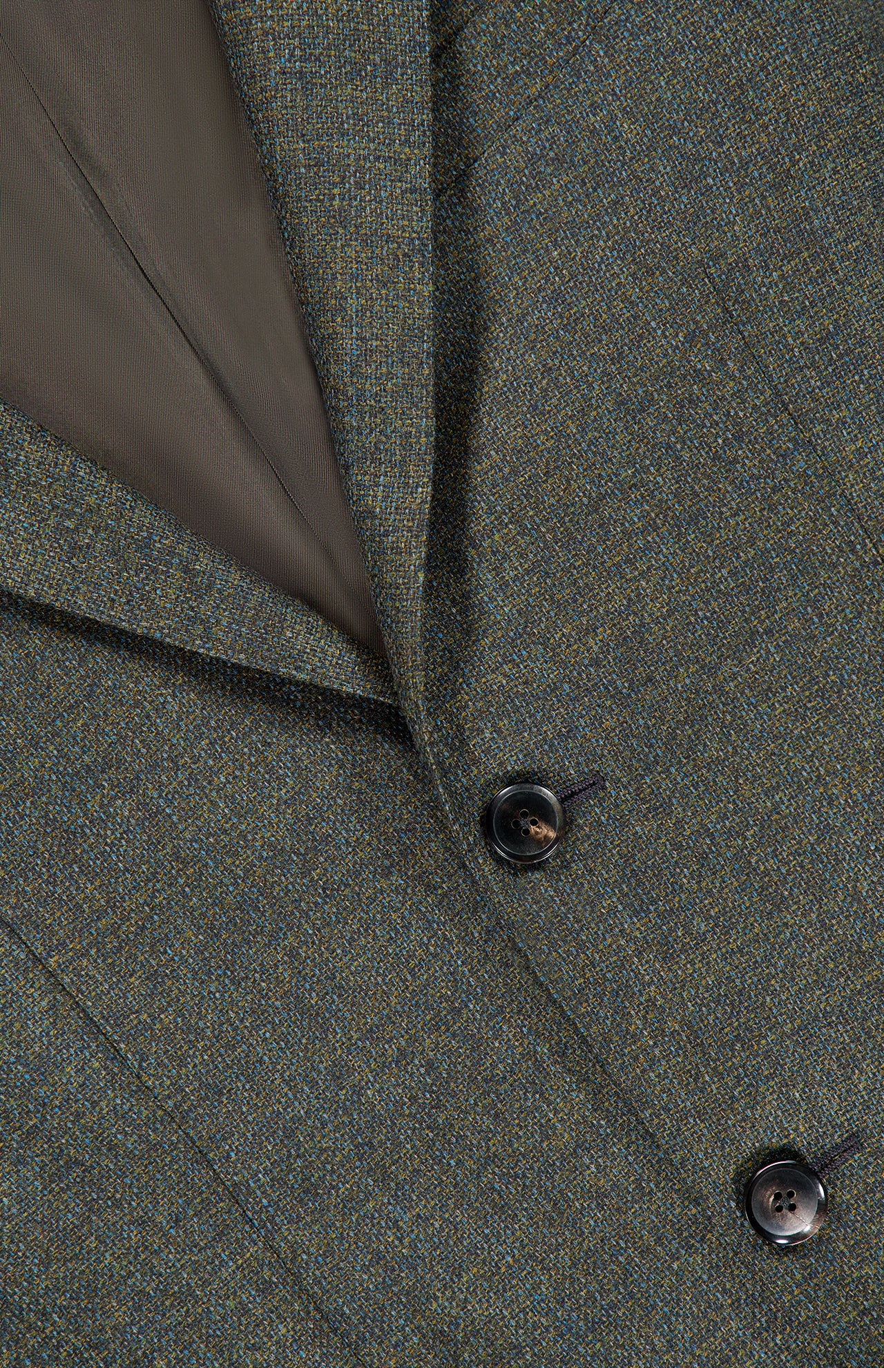 Close-up of a textured olive green ZEGNA Wool & Cashmere Sportcoat featuring two dark horn buttons and a brown lapel lining.