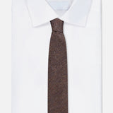 A neatly folded white dress shirt with a pointed collar is paired with the ZEGNA Wool & Silk Jacquard Tie, crafted in Italy from luxurious wool and silk, and displayed against a plain white background.