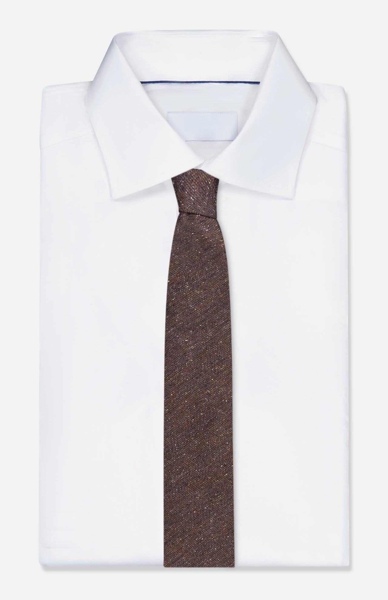 A neatly folded white dress shirt with a pointed collar is paired with the ZEGNA Wool & Silk Jacquard Tie, crafted in Italy from luxurious wool and silk, and displayed against a plain white background.
