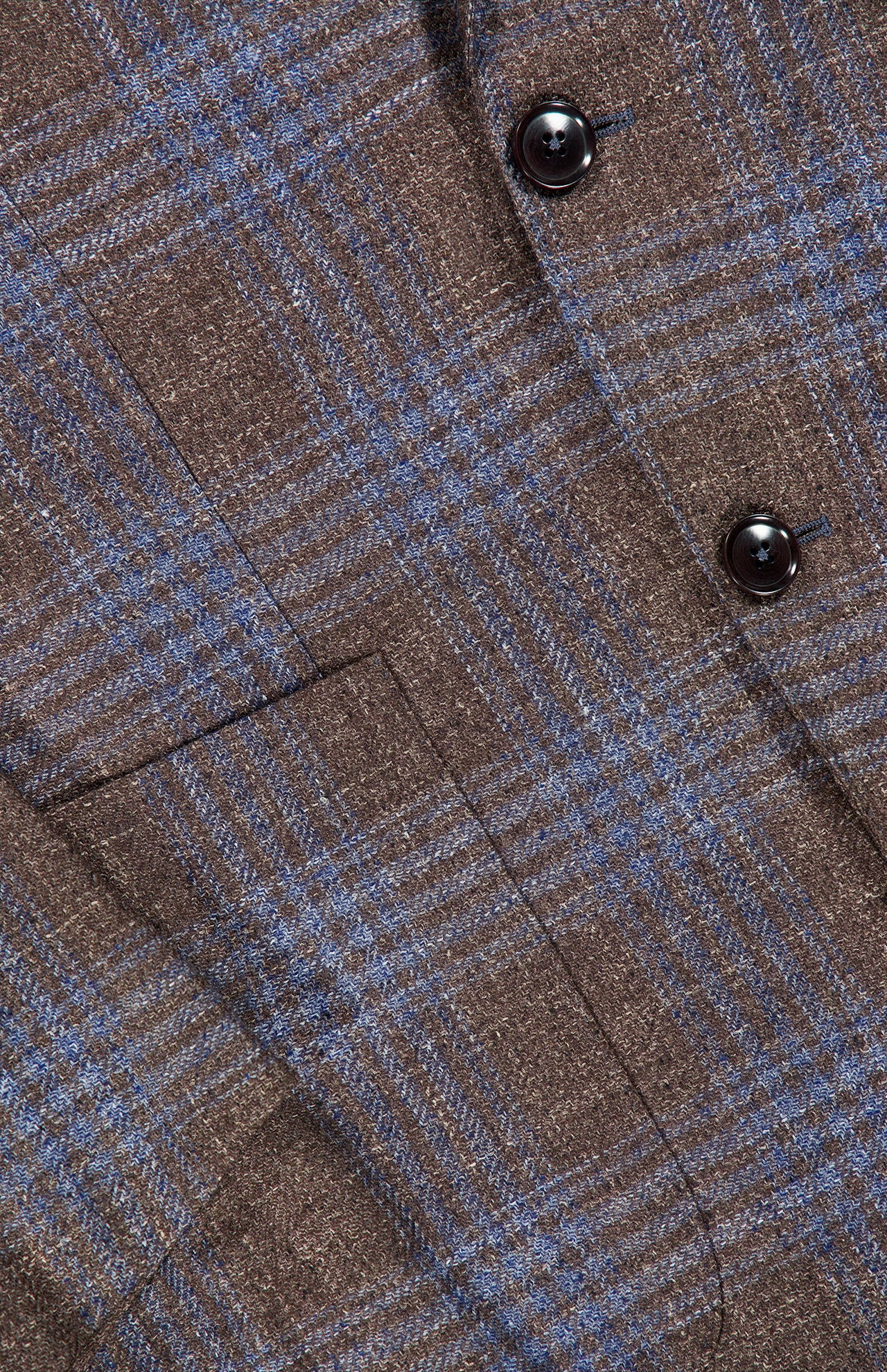Close-up of the ZEGNA Wool Silk Linen Sportcoat, featuring a brown and blue plaid pattern, crafted from a luxurious wool-silk-linen blend, with black buttons and part of the front pocket visible.