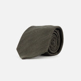 A ZEGNA Wool and Silk Tie in olive green, featuring a subtle diagonal striped pattern, is shown rolled up on a plain white background. Made in Italy.
