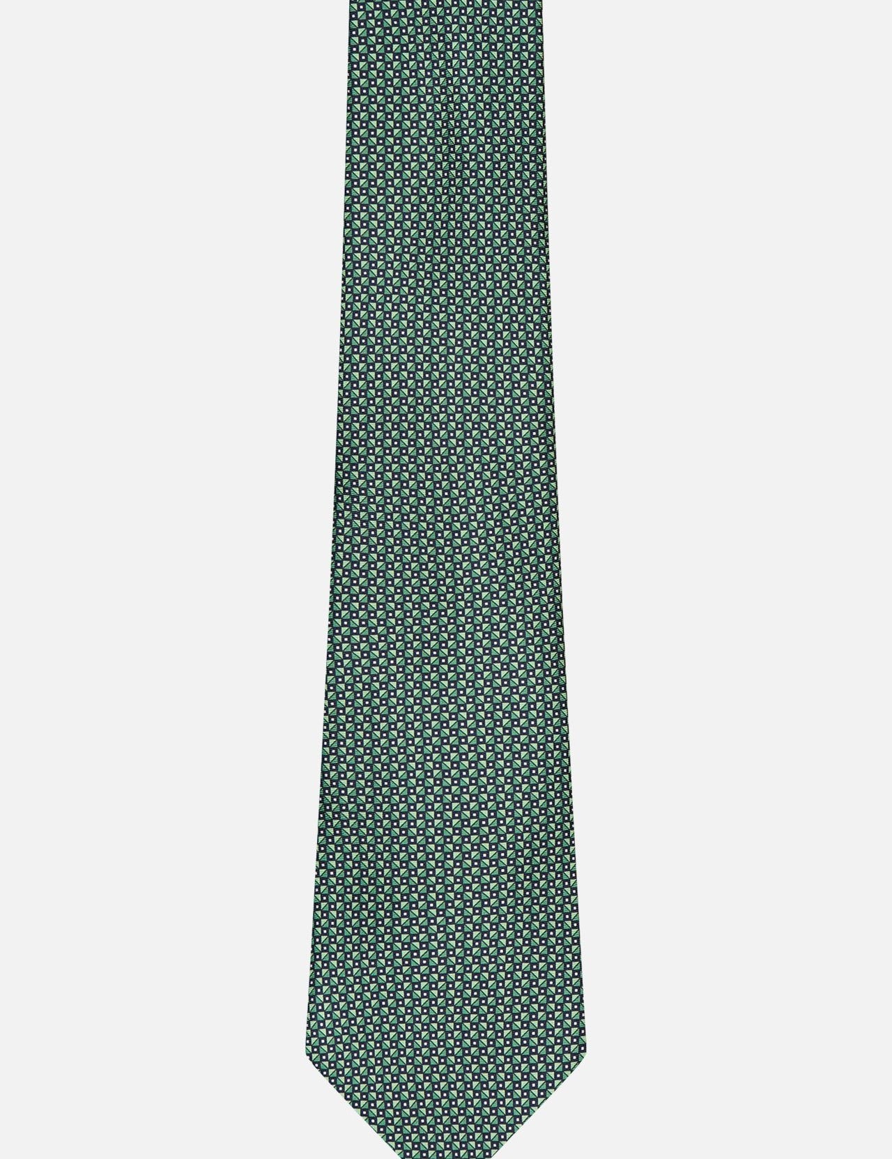 The ZEGNA Printed Silk Tie is crafted in Italy from 100% silk in green with a white geometric pattern, shown on a plain white background.