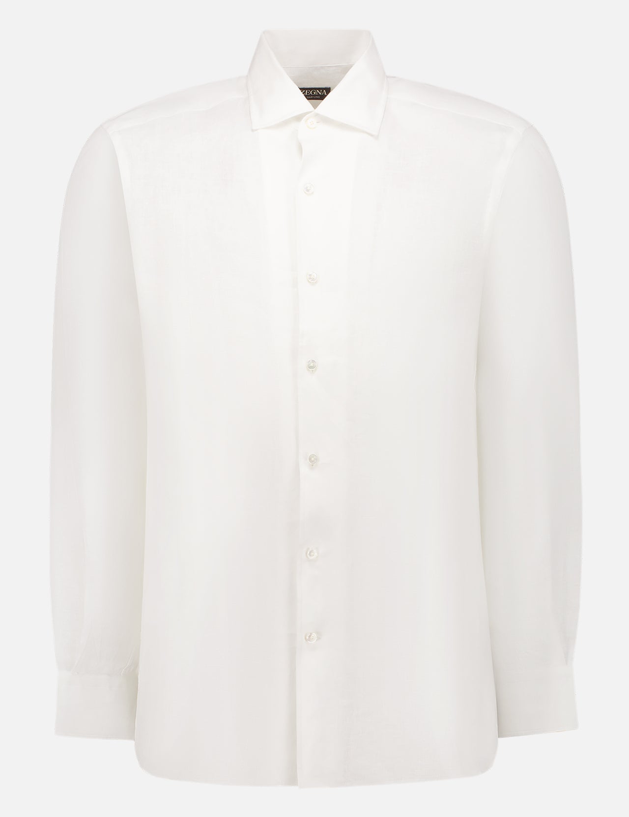 The ZEGNA Pure Linen Long Sleeve Shirt features a classic collar and button-up front in white, crafted in Italy and displayed on a plain light background.