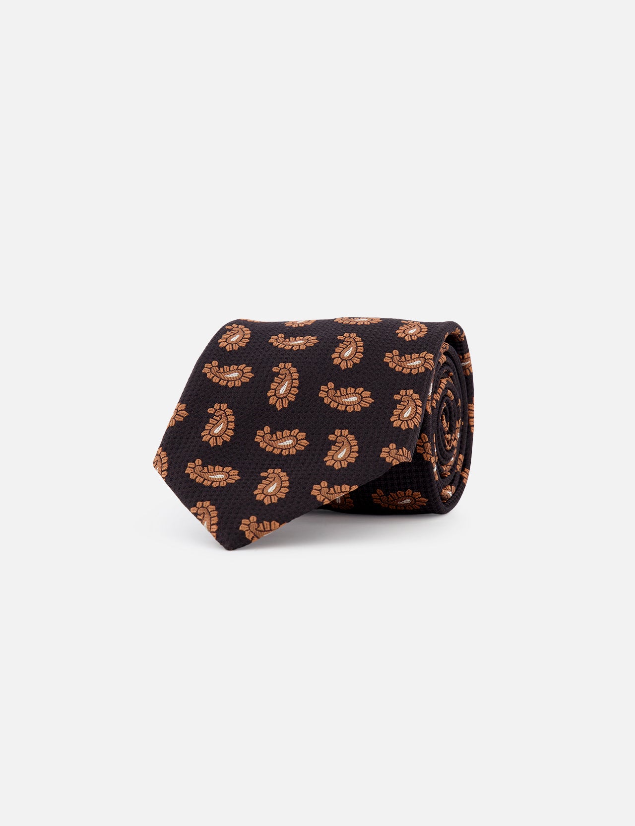 The ZEGNA Silk Jacquard Tie - Pure Black is a luxury accessory crafted from black silk, featuring an eye-catching orange paisley print, presented rolled up on a plain white background.