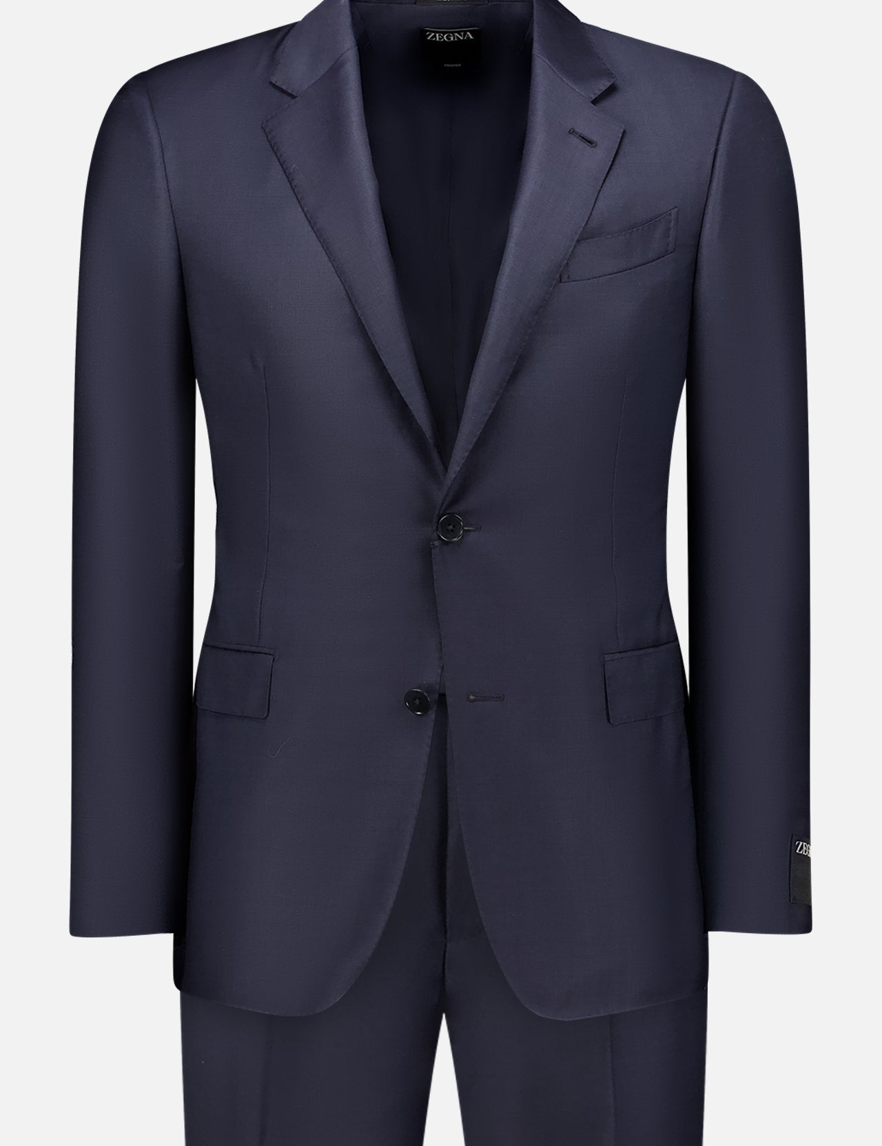 The ZEGNA Trofeo Milano Suit Navy is a men's two-piece suit made in Italy from 100% wool, featuring a tailored blazer with notch lapels, two buttons, front flap pockets, and matching trousers, shown on a white background.