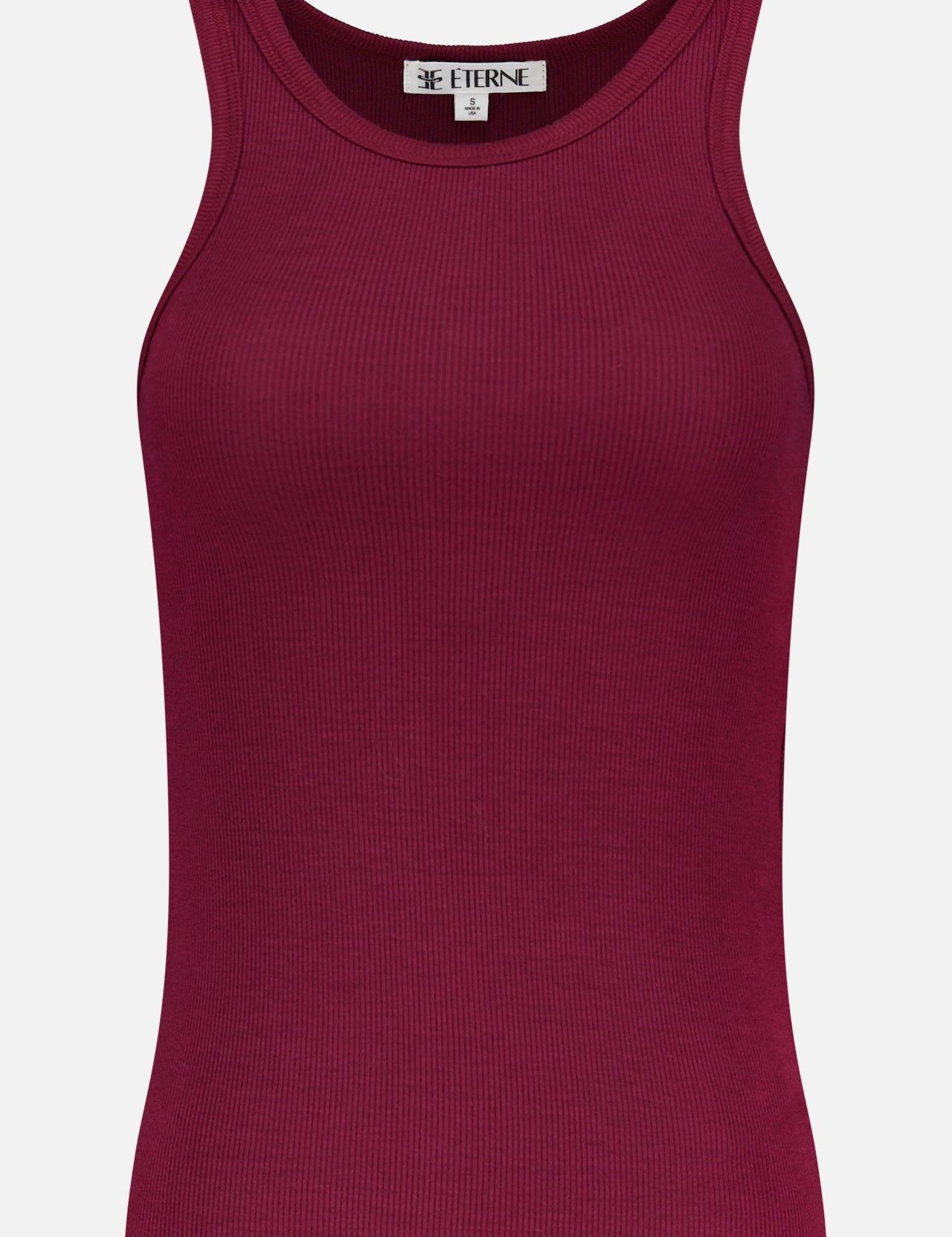 The ETERNE High Neck Fitted Tank Top is a sleeveless, ribbed, dark red (burgundy) top with a crew neckline, shown on a plain white background and featuring the brand label inside the neckline.