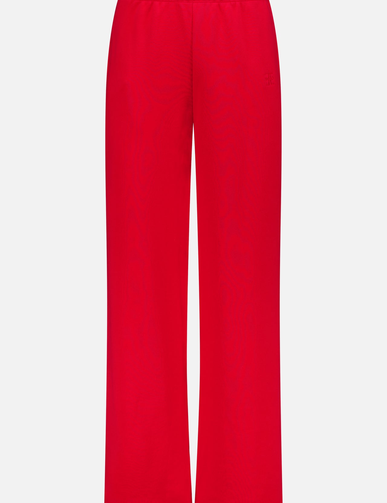 The ETERNE Oversized Wide Leg Sweatpant features a relaxed fit, elastic waistband, and soft French terry fabric. Shown in bright red against a white background, it's perfect for comfortable, casual wear.