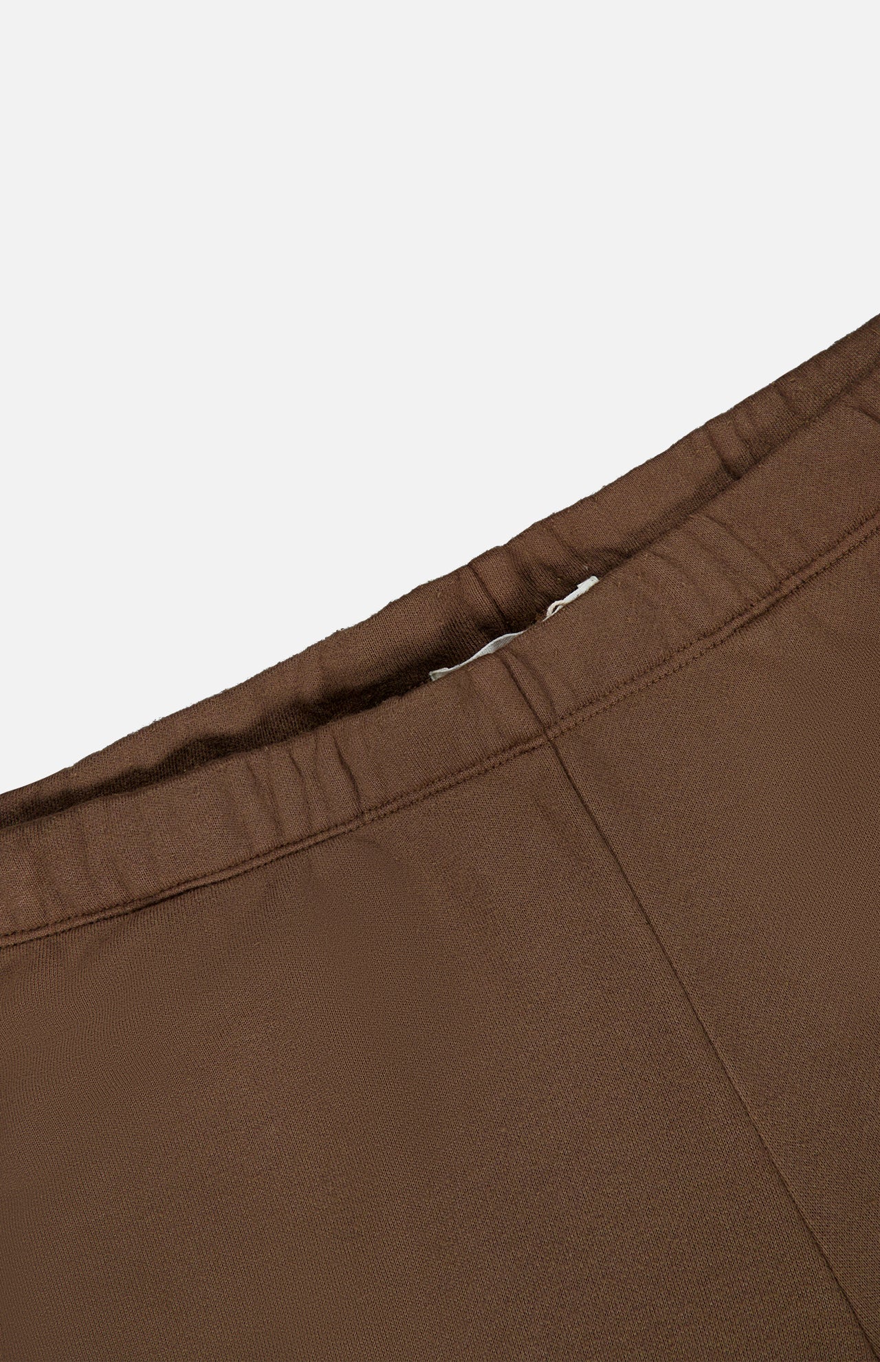 Close-up of the waistband and seam of the ETERNE Oversized Wide Leg Sweatpant in brown, highlighting the stitching and French Terry fabric texture against a plain white background.