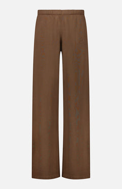 The ETERNE Oversized Wide Leg Sweatpant, featuring a brown French terry fabric, elastic waistband, and a subtle logo on the upper left side, is displayed against a plain white background.
