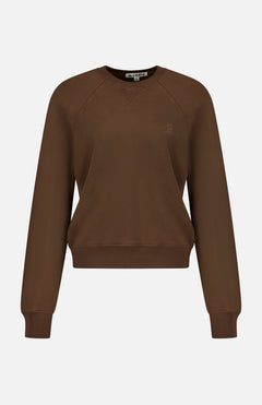 The ETERNE Shrunken V-Stitch Raglan Sweatshirt is a plain brown French Terry crewneck featuring ribbed cuffs and a shrunken fit, perfect for everyday wear, shown on a white background.