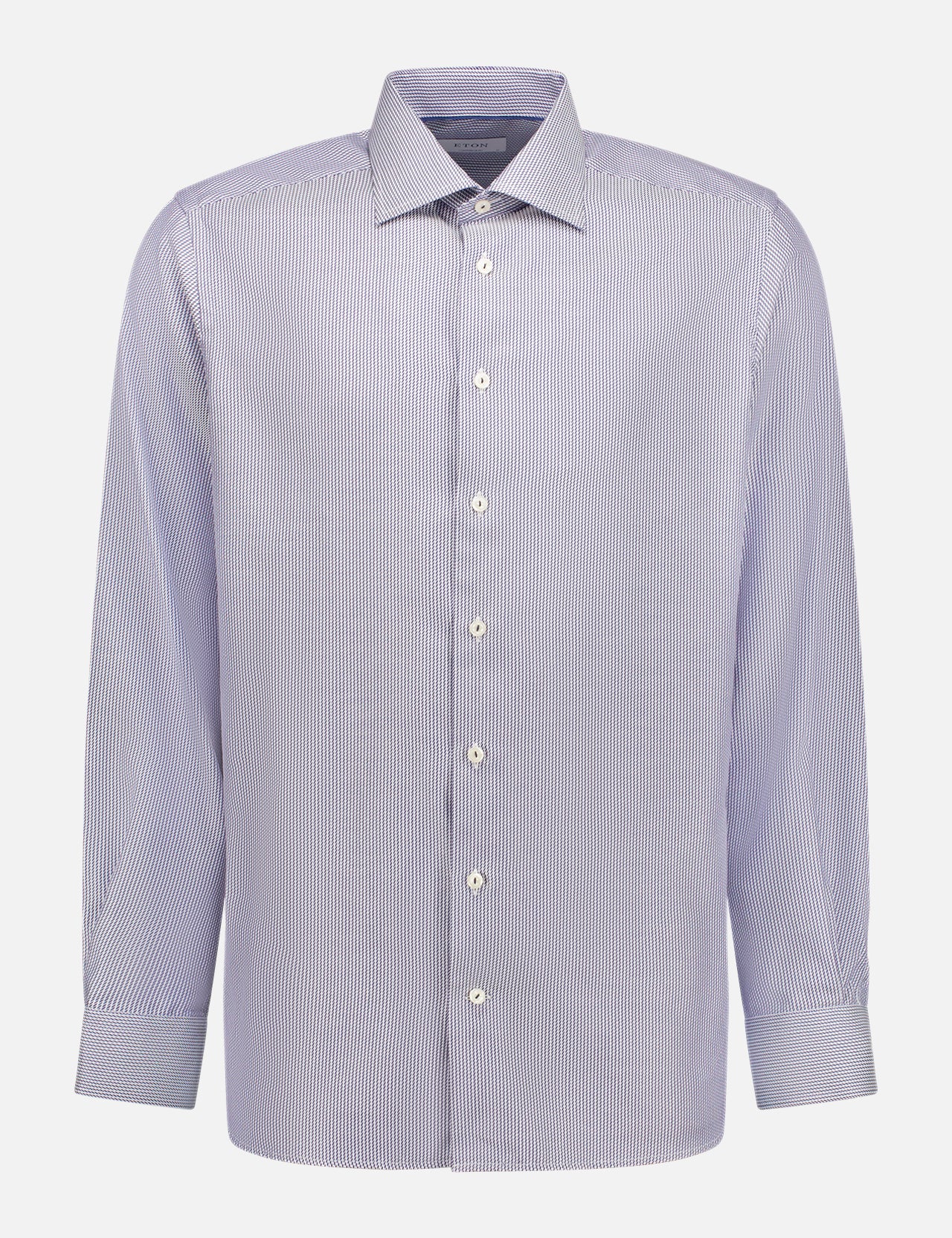 The ETON Dark Blue Striped Signature Twill Shirt features long sleeves, a pointed collar, buttoned cuffs, and subtle blue and white stripes. Made from 100% cotton, it is displayed against a plain white background.