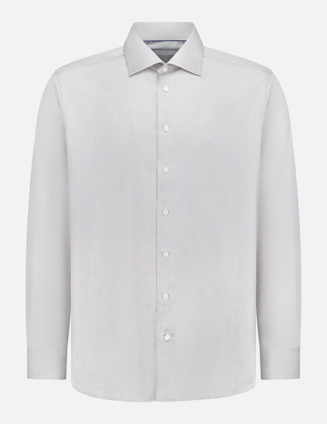 The ETON Contemporary Fit Solid Signature Twill Shirt is a light gray, long-sleeved button-up made from 100% cotton, featuring a collar—ideal for versatile workwear and displayed against a white background.