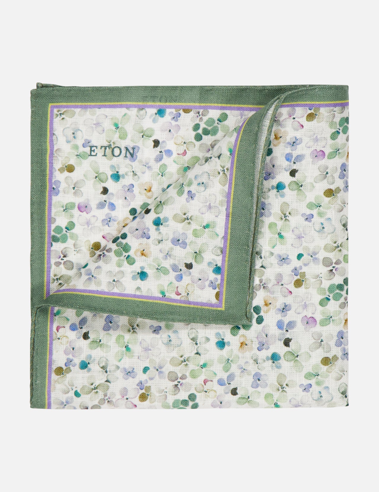 The ETON Floral Linen Pocket Square features a green border, multicolored dots, and "ETON" embroidered in blue on one corner.