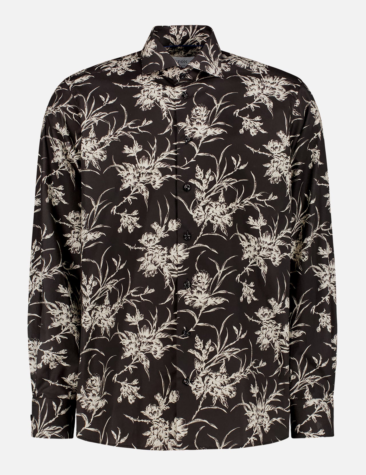 The ETON Floral Signature Twill Shirt is a slim-fit, long-sleeved black button-up with a white floral print, collar, and elegant design—perfect for any occasion.