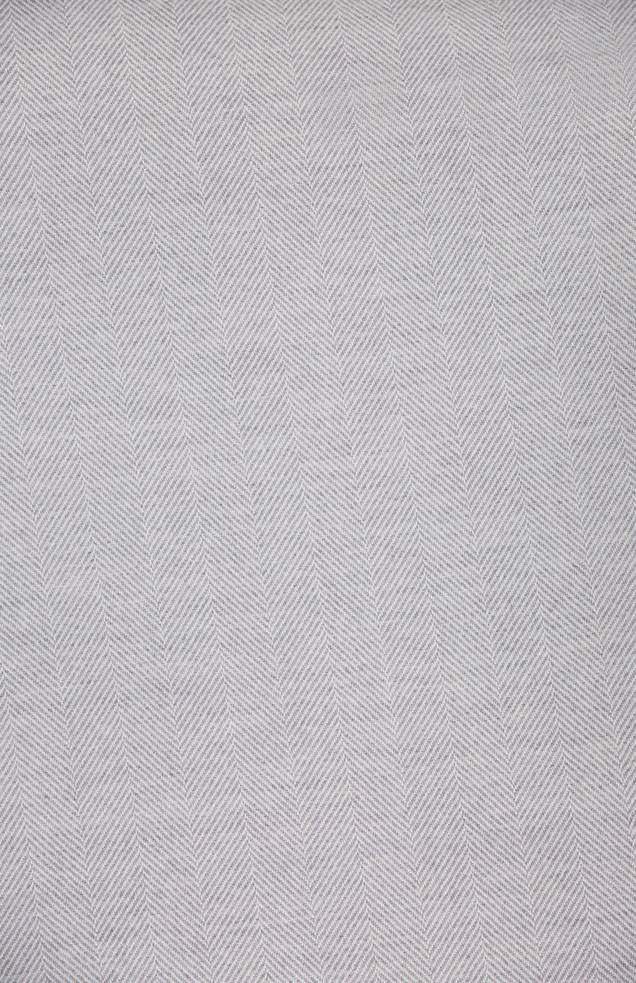 The ETON Herringbone Merino Wool Scarf features a subtle chevron pattern in light gray. Soft, textured, and expertly crafted in Italy, this elegant accessory is made from premium merino wool.