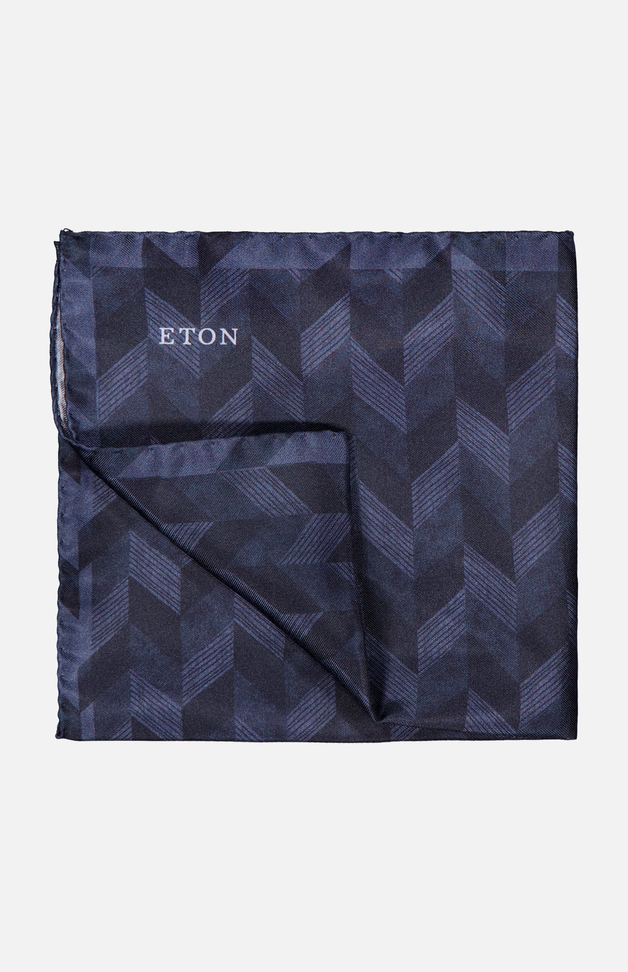 A sophisticated men's accessory, the ETON Chevron Silk Twill Pocket Square in navy blue showcases a refined chevron pattern and is elegantly displayed against a plain light background.