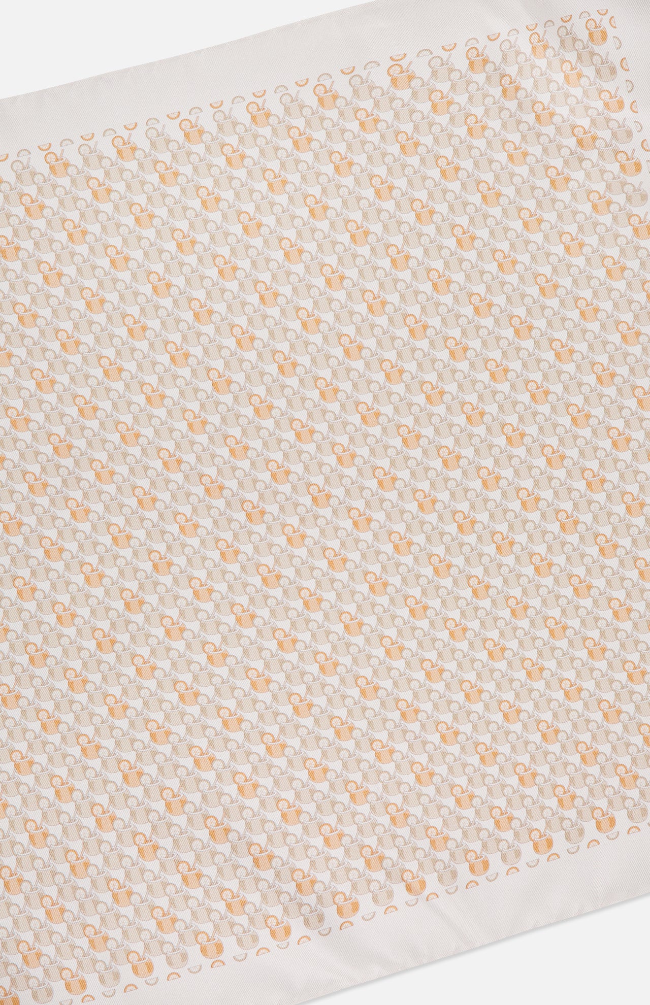 The ETON Cocktail Silk Twill Pocket Square features a white base with interlocking peach and beige geometric patterns and a plain white border. Made in Italy, this luxury accessory adds subtle elegance to any outfit.