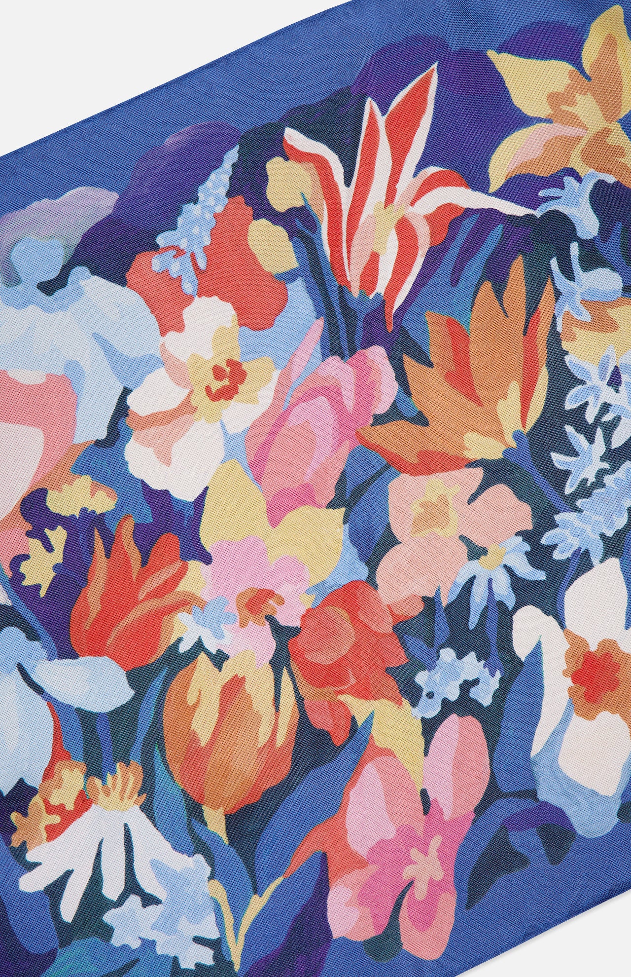 The ETON Floral Oxford Silk Pocket Square features a vibrant, abstract floral design with red, orange, pink, yellow, white, and blue flowers set against a deep blue background for a dynamic and luxurious look.