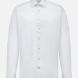 The ETON Geometric Effect Twill Contemporary Shirt is a long-sleeve button-up dress shirt, crafted from wrinkle-resistant cotton with a subtle geometric pattern, featuring a crisp collar and distinctive gold buttons, displayed on a white background.