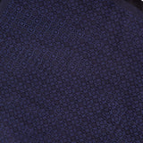 A close-up view of the ETON Medallion Woven Silk Pocket Square, featuring an intricate circular geometric pattern in dark blue with a solid navy border—making it a truly luxurious accessory.