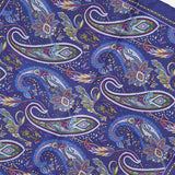 The ETON Paisley Silk Twill Pocket Square showcases a luxurious blue background enhanced by a vibrant paisley pattern in shades of blue, green, purple, and yellow, finished with a solid blue border. This striking accessory is perfect for adding an elegant touch to any ensemble.