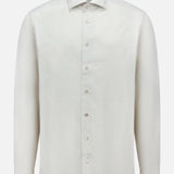 The ETON Semi Solid Cotton Linen Dress Shirt features long sleeves, a classic collar, and a plain white design—ideal for formal occasions and pictured against a white background.