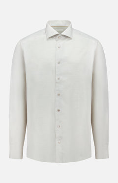 The ETON Semi Solid Cotton Linen Dress Shirt features long sleeves, a classic collar, and a plain white design—ideal for formal occasions and pictured against a white background.