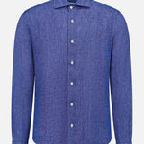 The ETON Solid Linen Dress Shirt, a textured long-sleeve, button-up in solid blue, is shown against a plain white background.