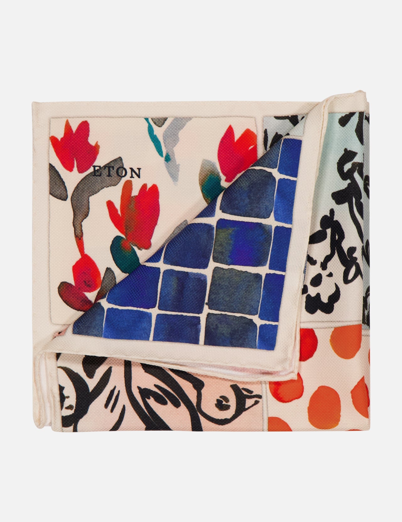 The ETON Artistic Cotton Pocket Square is folded and features a cream background with colorful abstract patterns—red flowers, blue squares, black calligraphy, and orange dots.