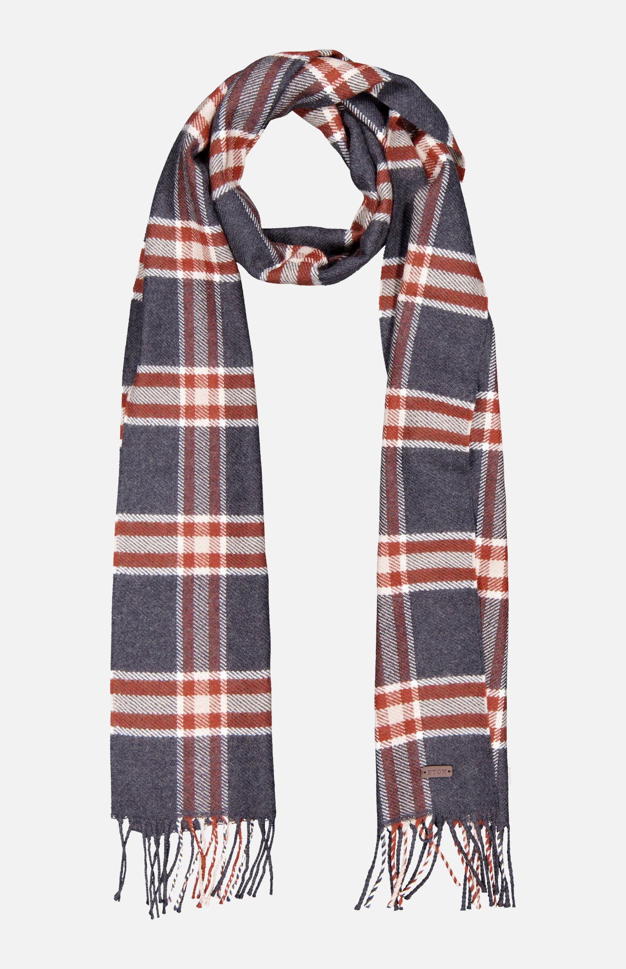 The ETON Plaid Merino Wool Scarf features a classic gray, white, and red plaid design with fringed ends. Made in Italy, it's shown laid flat on a white background.